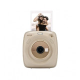 Instant printing cameras